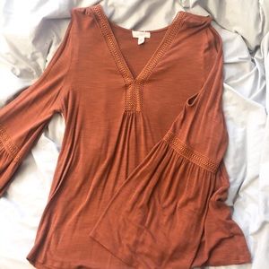 Open shoulder bell shirt
